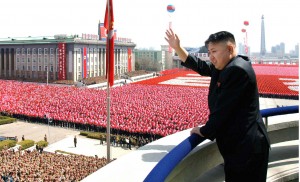 In this Sunday, April 15, 2012 photo released by the Korean Central News Agency and distributed by the Korea News Service on April 16, 2012, North Korean leader Kim Jong Un acknowledges cheers during a mass military parade in Kim Il Sung Square to celebrate the centenary of the birth of his grandfather, national founder Kim Il Sung in Pyongyang, North Korea. (AP Photo/Korean Central News Agency via Korea News Service) JAPAN OUT UNTIL 14 DAYS AFTER THE DAY OF TRANSMISSION